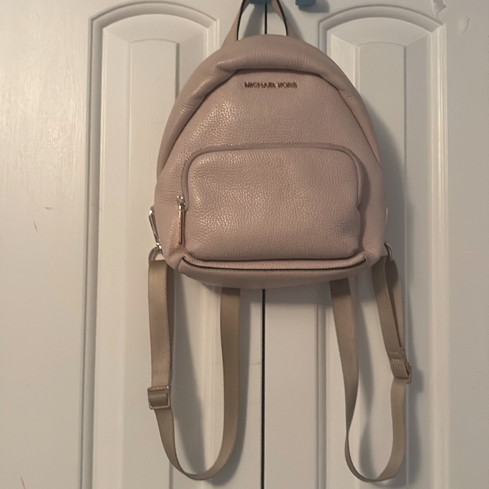 Micheal Kors back pack/sling, light pink with gold lettering